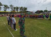Babinsa Wonosari Bersama Bhabinkamtibmas Amankan Kegiatan Road Show SSB Arseto Di Klaten