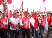 Semarak HUT ke-79 RI, Pj. Bupati Bogor Pimpin Langsung Ribuan Peserta Kirab Bendera Merah Putih