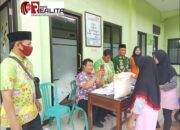 Badan Pangan Nasional Salurkan Bantuan Pangan Kepada 349 KPM di Desa Legok Pasuruan